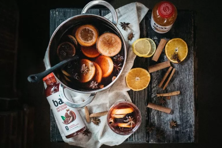 Hot mulled wine punch with cinnamon sticks and Bai Costa Rica Clementine and Bai Ipanema Pomegranate